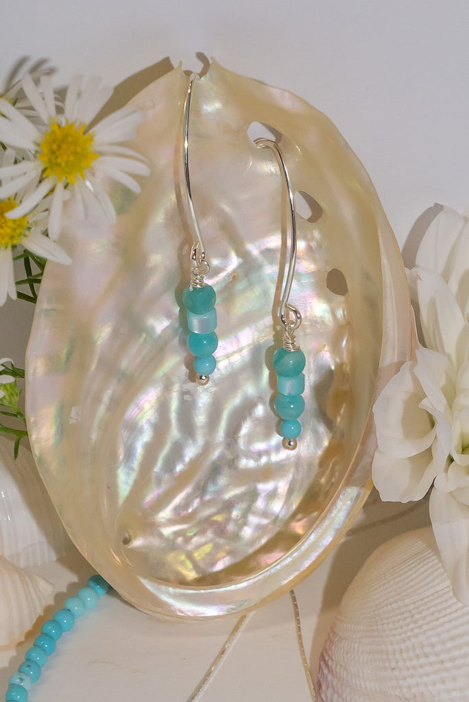 With a swirl of tropical sea colours this beautiful and delicate earrings is wonderful gentle way to add some colour to your outfit.