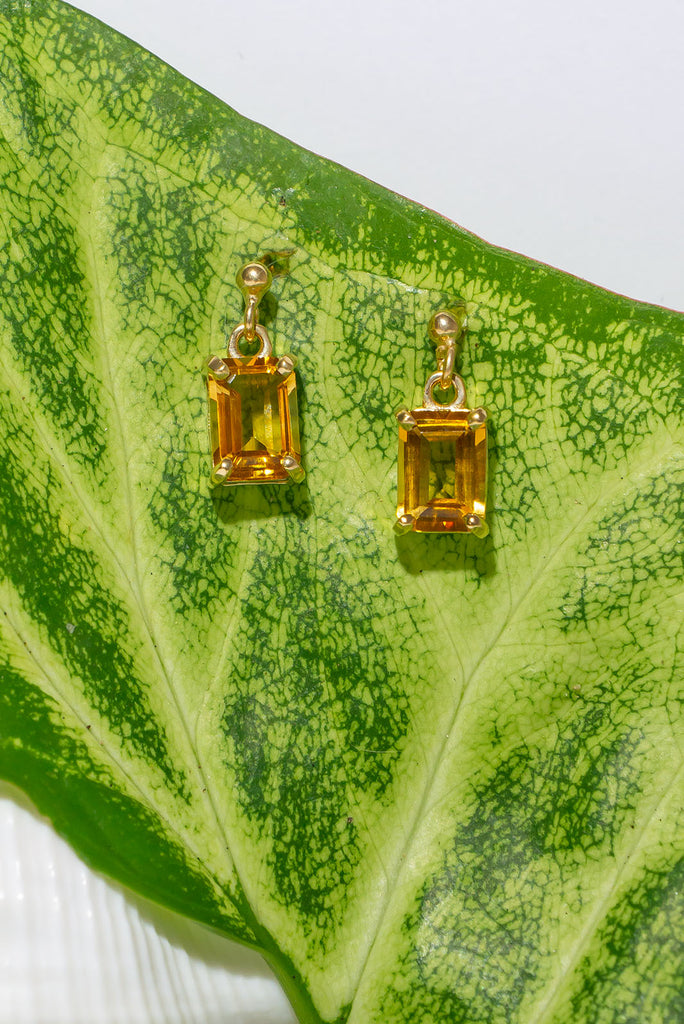 These lovely clear sunshine yellow Citrine earrings are like a summer holiday for your soul. Pretty earrings with an emerald cut yellow Citrine gemstones set in 9ct gold vermeil. Made exclusively for Mombasa Rose Boutique.