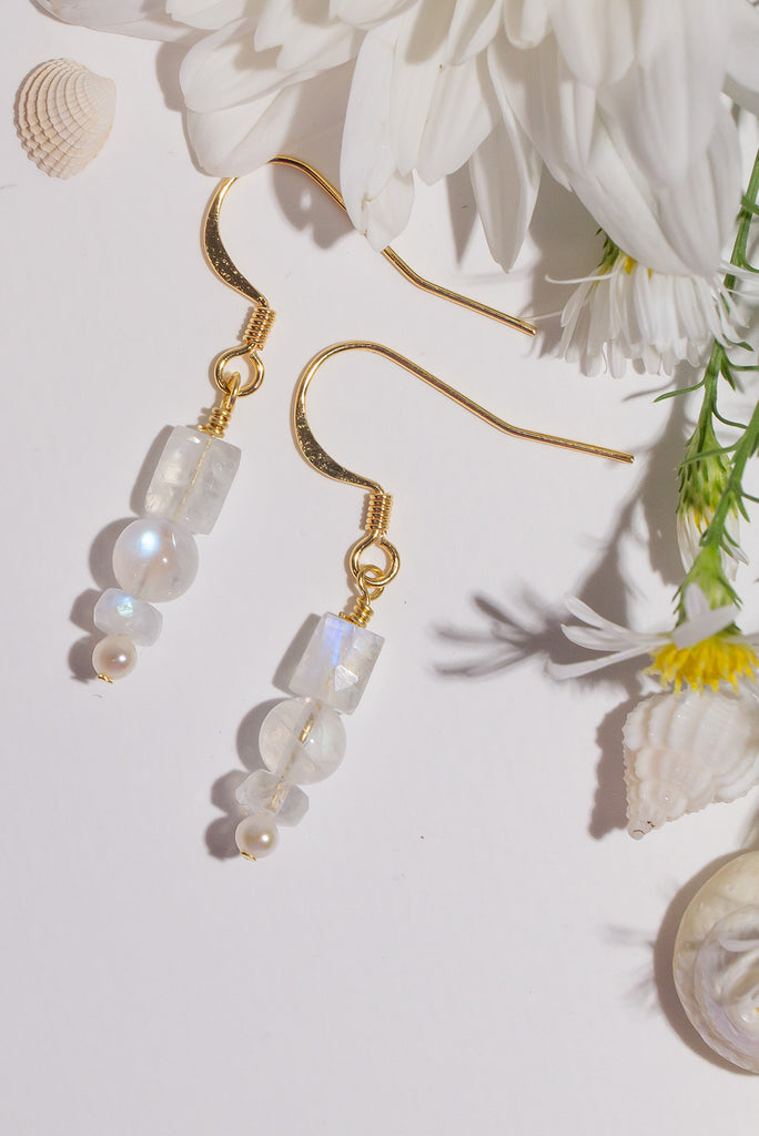 Discover the beautiful soft shimmering tones of moonstone. Our dainty Moonstone Shimmer Earrings are the perfect sparkling accessories.