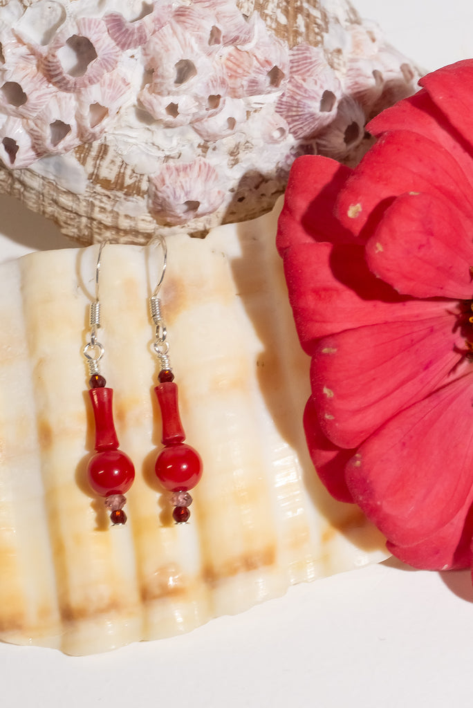 Boasting a burst of red, these red coral droplets earrings are the perfect companion to seaside adventures.