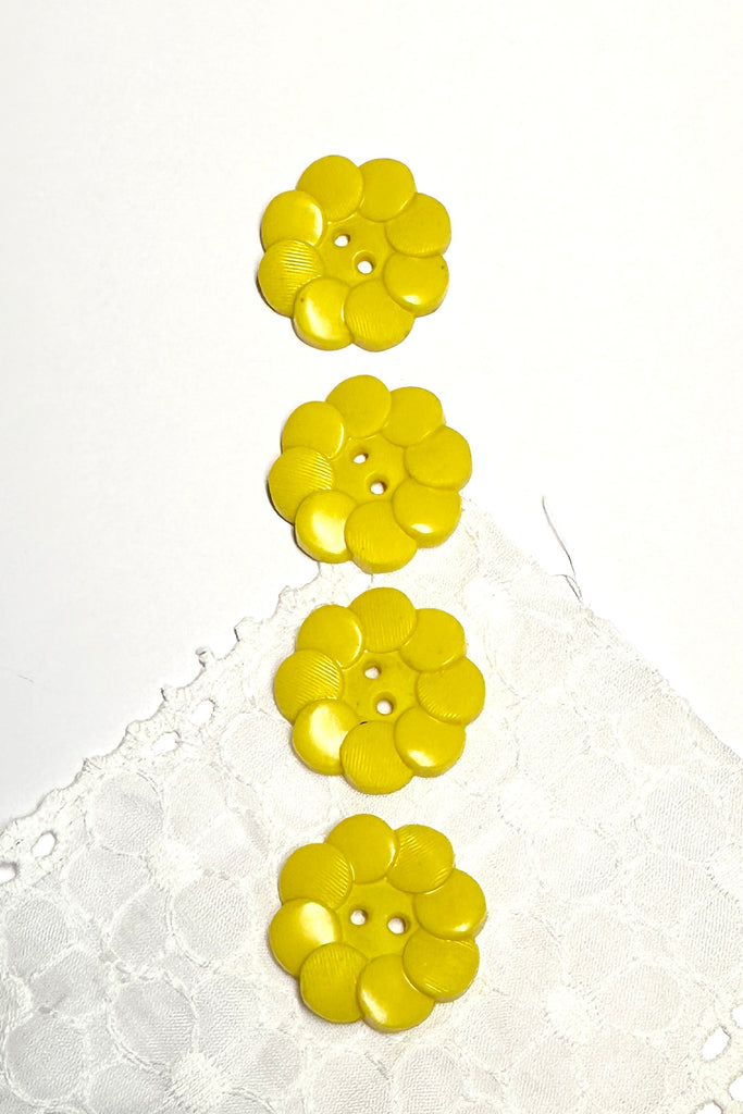 Quirky yellow buttons from the 1940,s. Great for any sewing or craft project.