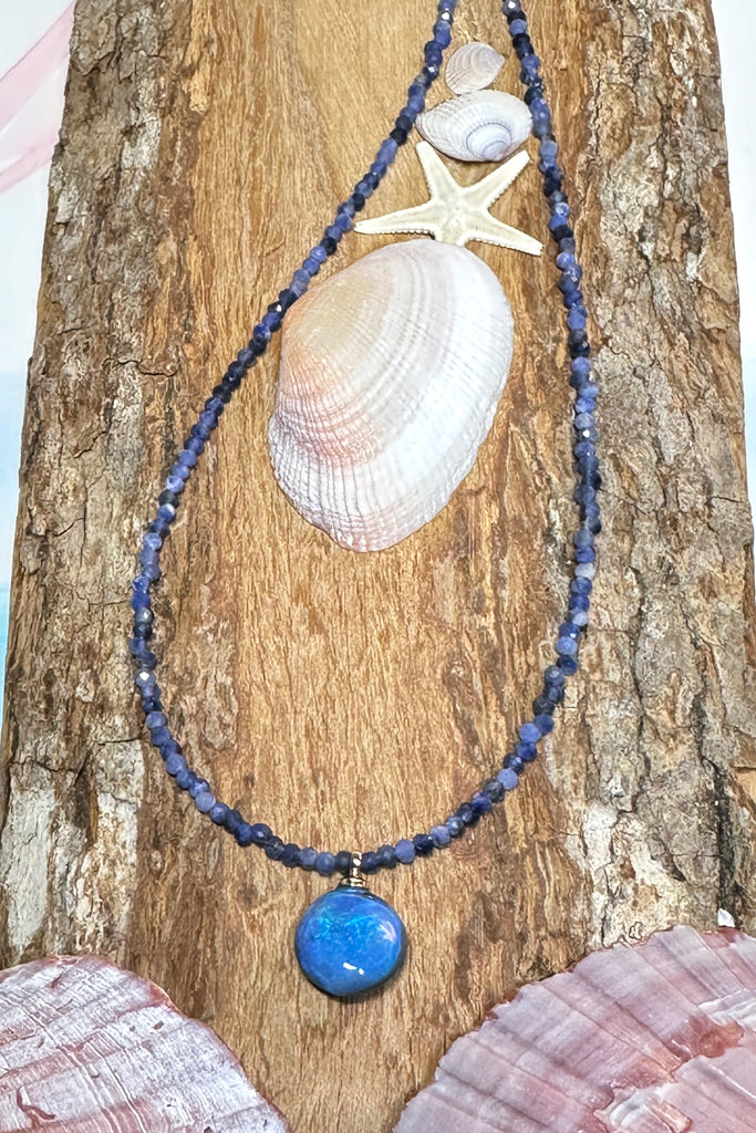 pretty blue opal pendant, its on a Sodalite&nbsp;bead gemstone necklace that sparkles in the light