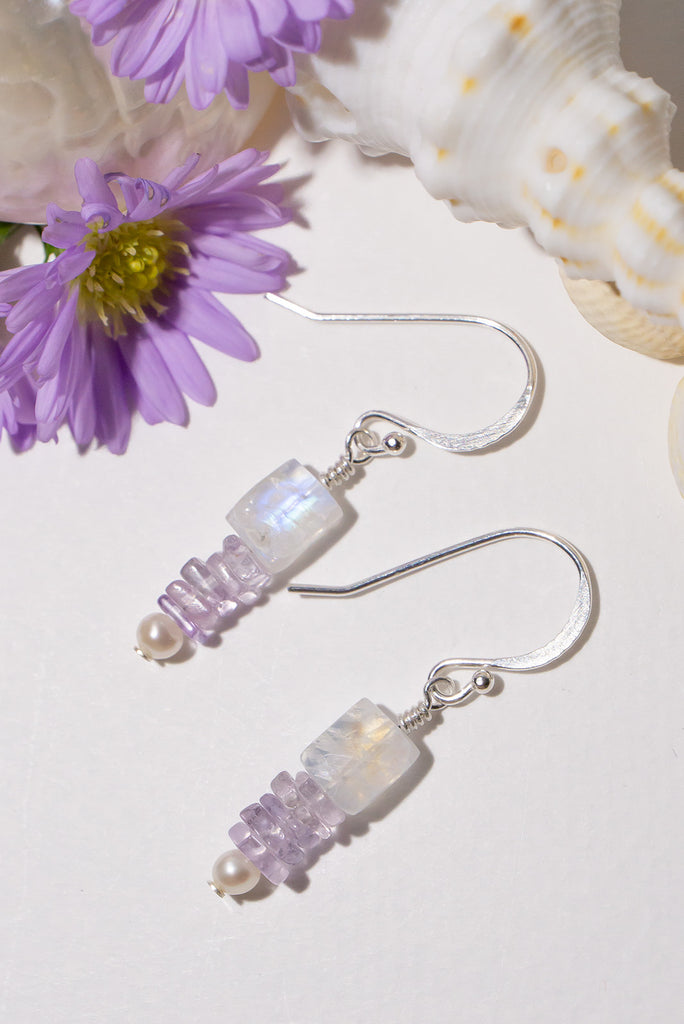 A delicate stack of shimmering gems. Our delicate Kunzite & Moonstone Pier Earrings have a beautiful ethereal quality