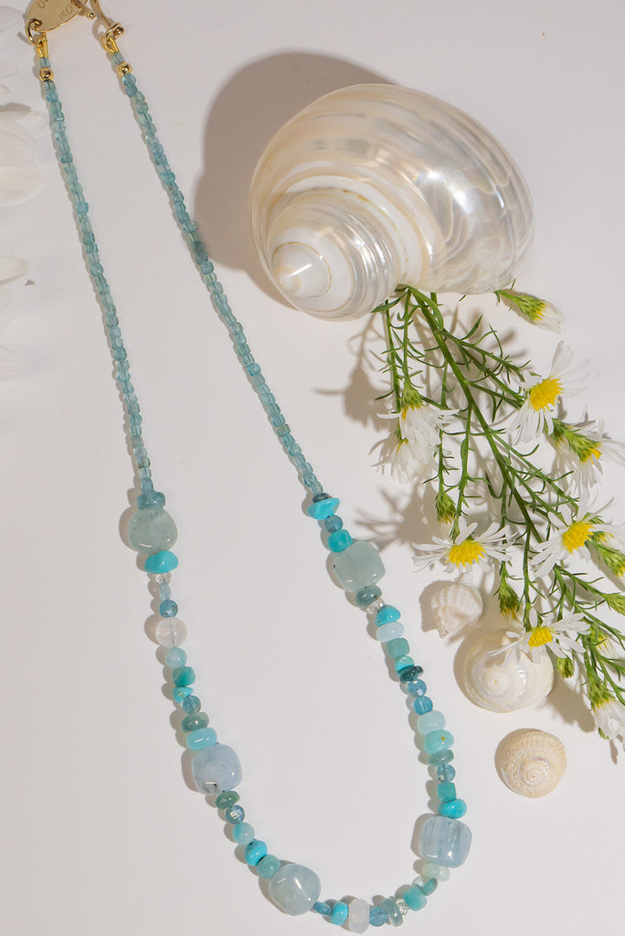 Inspired by all the colours of a tropical sea. Featuring tones of aqua, sea green and turquoise this is a beautiful necklace to brighten up your day.
