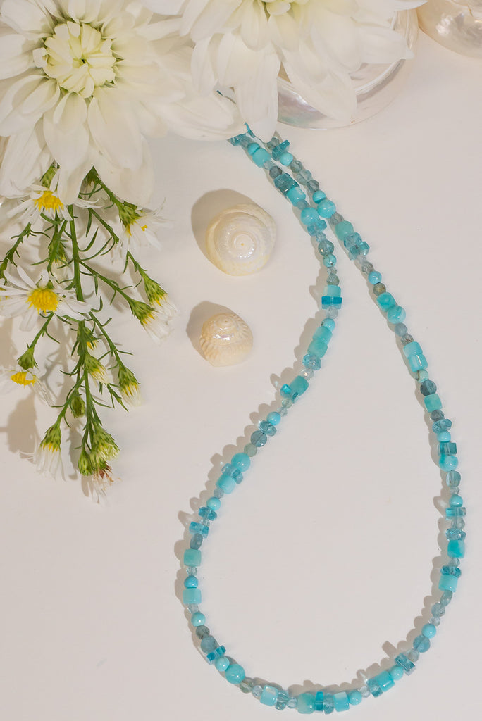 With a swirl of tropical sea colours this beautiful and delicate necklace is wonderful gentle way to add some colour to your outfit.