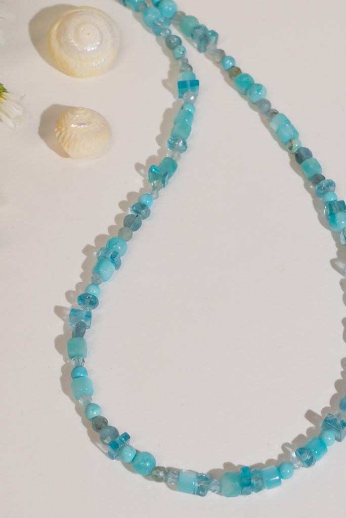 With a swirl of tropical sea colours this beautiful and delicate necklace is wonderful gentle way to add some colour to your outfit.