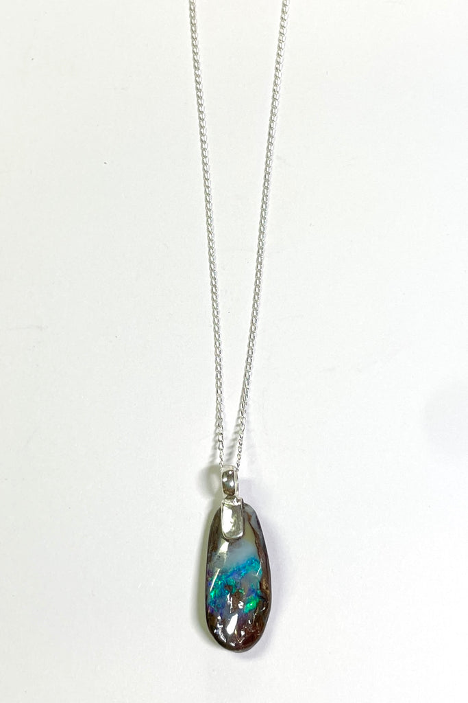 Australian Opal is from Winton, this intriguing piece of Boulder Opal was mined, cut and polished in Queensland.