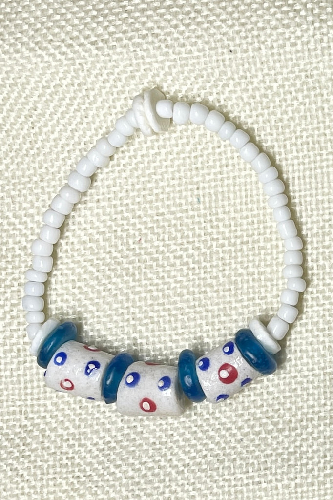This bracelet was made by combining a unique combination of recycled glass African Beads