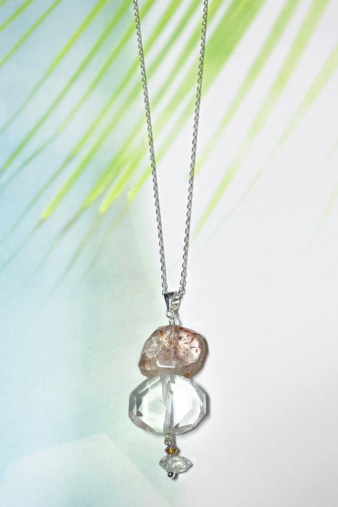 A pretty pendant of Strawberry Quartz that has been flat cut and faceted to reveal all the lovely glittery inclusions hidden inside.