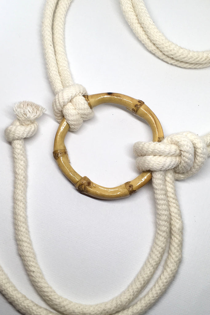 A luxurious rope tie belt with a funky bamboo belt buckle