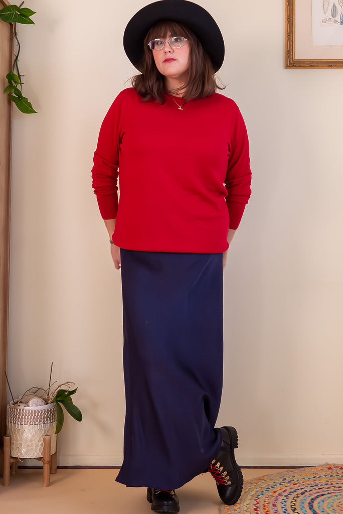 The Bianca Midnight Bias Cut Maxi Skirt is a navy maxi skirt with satin finish. The skirt features a bias cut, elasticated waist and belt loop with removable waist tie pocket. Made from viscose/rayon.