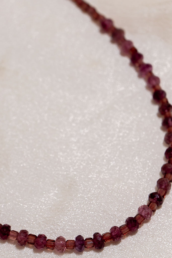 Choker style Cerise Drifts Necklace featuring beaded Garnet and Rhodolite Garnet with gold vermeil findings.