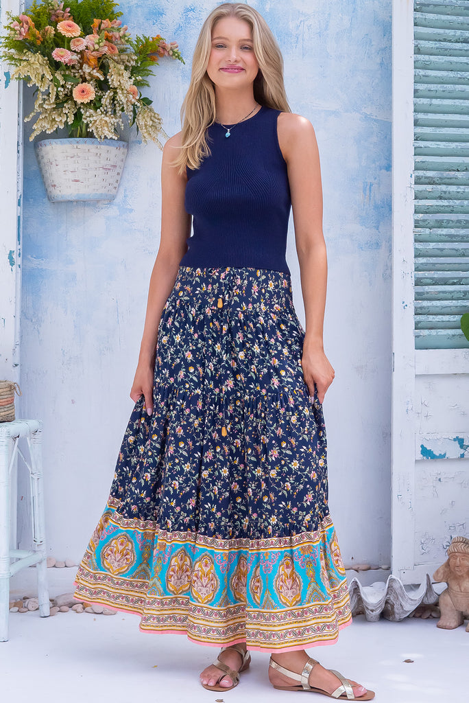 The Cosima Olina Ink Maxi Skirt is a beautiful ink blue maxi skirt with a bohemian style print and border feature. The maxi skirt features an elastic waistband. Made from 100% rayon.