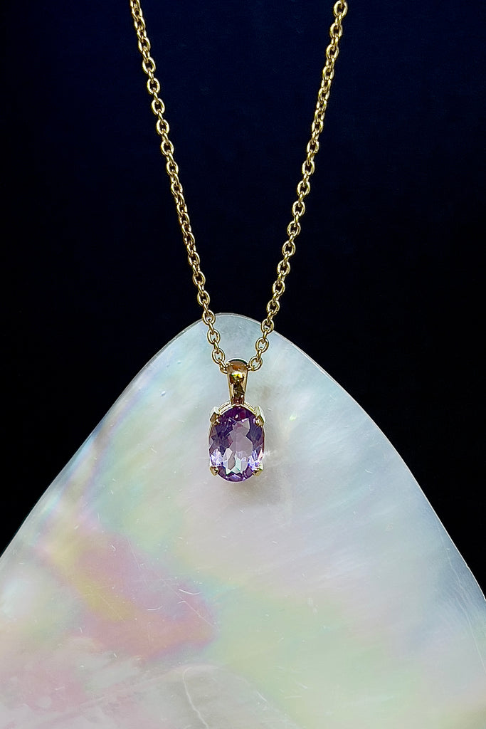 A delicate oval cut Amethyst pendant set in 9ct gold vermeil. This piece is perfectly set between modern chic and classic romantic style. Made for Mombasa Rose Boutique.