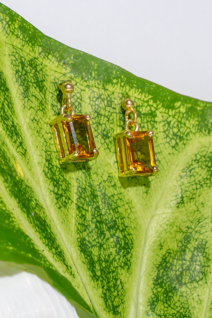 These lovely clear sunshine yellow Citrine earrings are like a summer holiday for your soul. Pretty earrings with an emerald cut yellow Citrine gemstones set in 9ct gold vermeil. Made exclusively for Mombasa Rose Boutique.