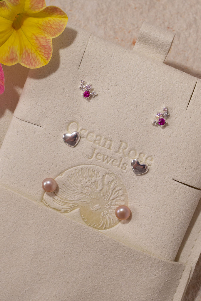Love is in the air with our dainty Sweet Romance stud earring trio.