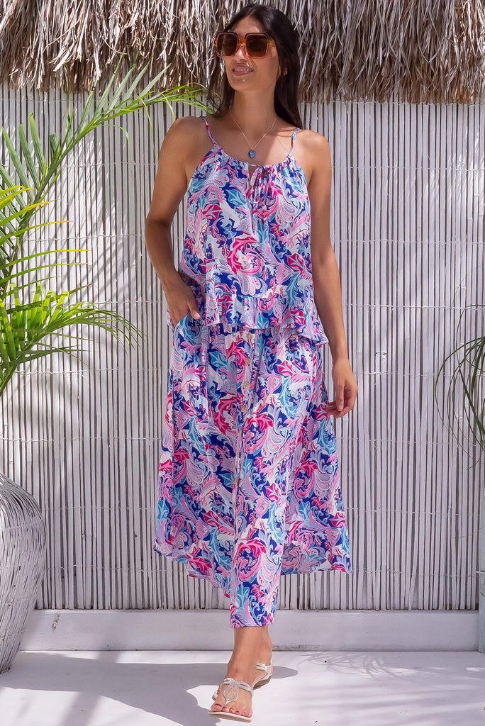 The Flirt St Tropez Blue Maxi Skirt is a gorgeous paisley printed maxi skirt in shades of blue, white and pink. The skirt features a v-yoke was it, elasticated back of waist, and side pockets. Made from 100% rayon.