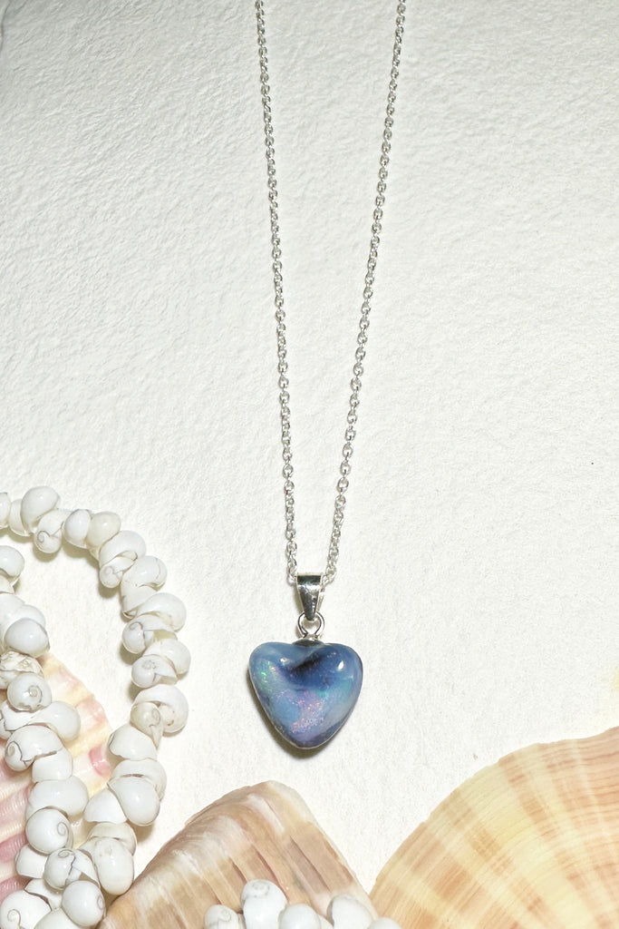 A sweet soft heart, this Australian Opal pendant is so gentle and sweet, with it's cloud of pink and pale green drifting across the base.