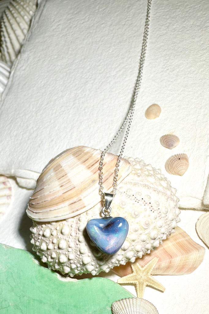 A sweet soft heart, this Australian Opal pendant is so gentle and sweet, with it's cloud of pink and pale green drifting across the base.