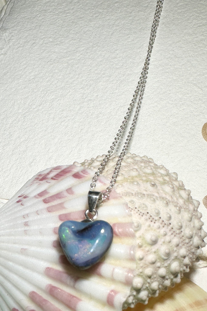A sweet soft heart, this Australian Opal pendant is so gentle and sweet, with it's cloud of pink and pale green drifting across the base.