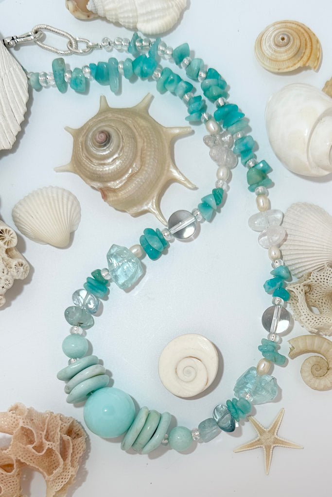 Stones are Blue Peruvian Opal, Amazonite, Rock Crystal, blue Quartz shards and Pearls. Many of these natural gemstones are "village" cut so are not regular, some carry inclusions or are irregular.