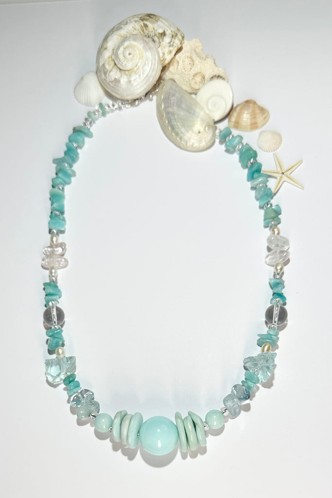 Stones are Blue Peruvian Opal, Amazonite, Rock Crystal, blue Quartz shards and Pearls. Many of these natural gemstones are "village" cut so are not regular, some carry inclusions or are irregular.