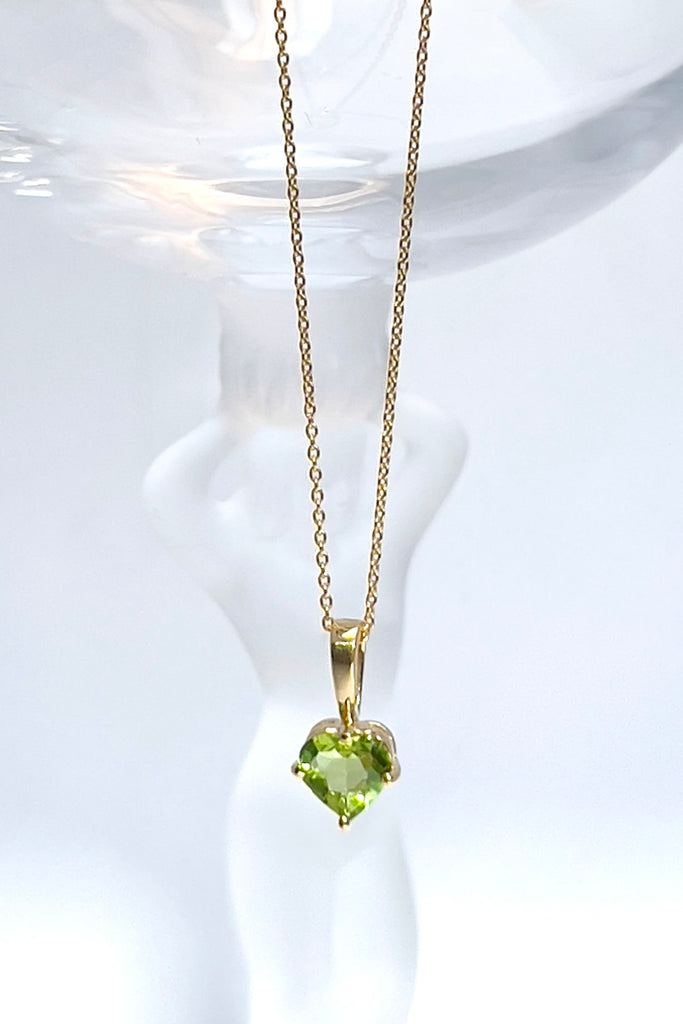 The pendant and chain are 9ct gold vermeil on a base of 925 silver, the gold is 2.5microns thick so will never rub or discolor A round Peridot gemstone set in 9ct gold vermeil. Topaz, Amethyst and Peridot gemstones.