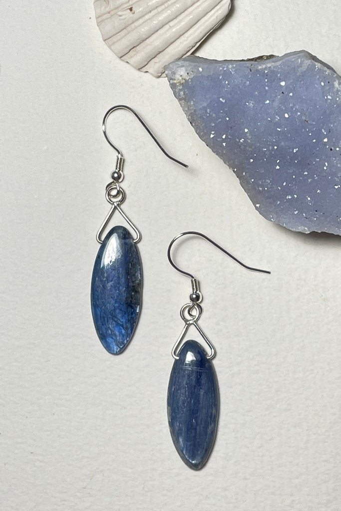 These Kyanite earrings feature a leaf shaped bead which is a hand cut and faceted from a shimmery cobalt blue Kyanite shard. Each pair is unique and handmade exclusively for us. 