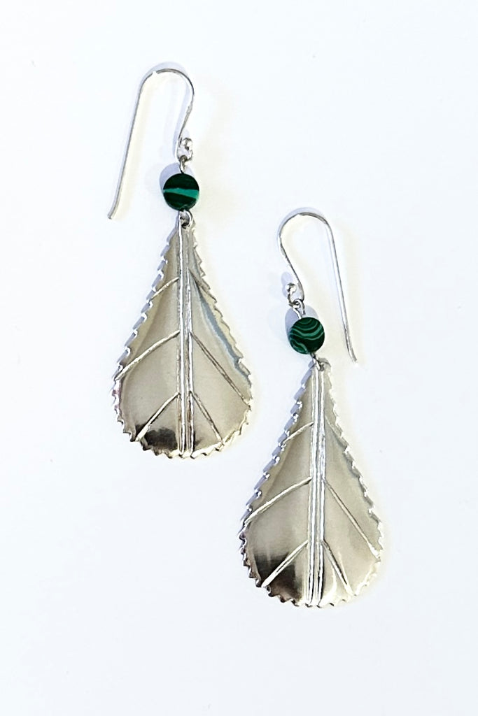 These African style leaf shaped earrings were designed in Mozambique, East Africa, exclusively for Mombasa Rose. In 925 silver, there is a small Malachite bead at the top