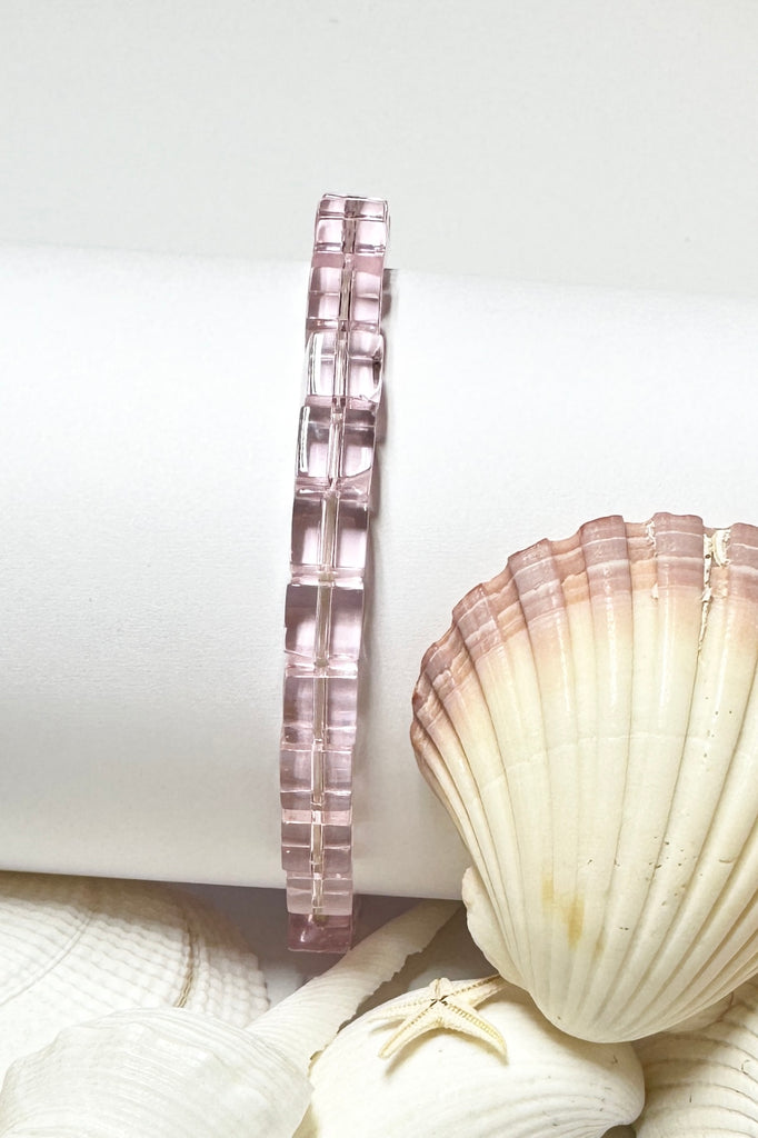 Perfectly easy and so pretty this bracelet of clear pale pink glass square bead on a stretch band
