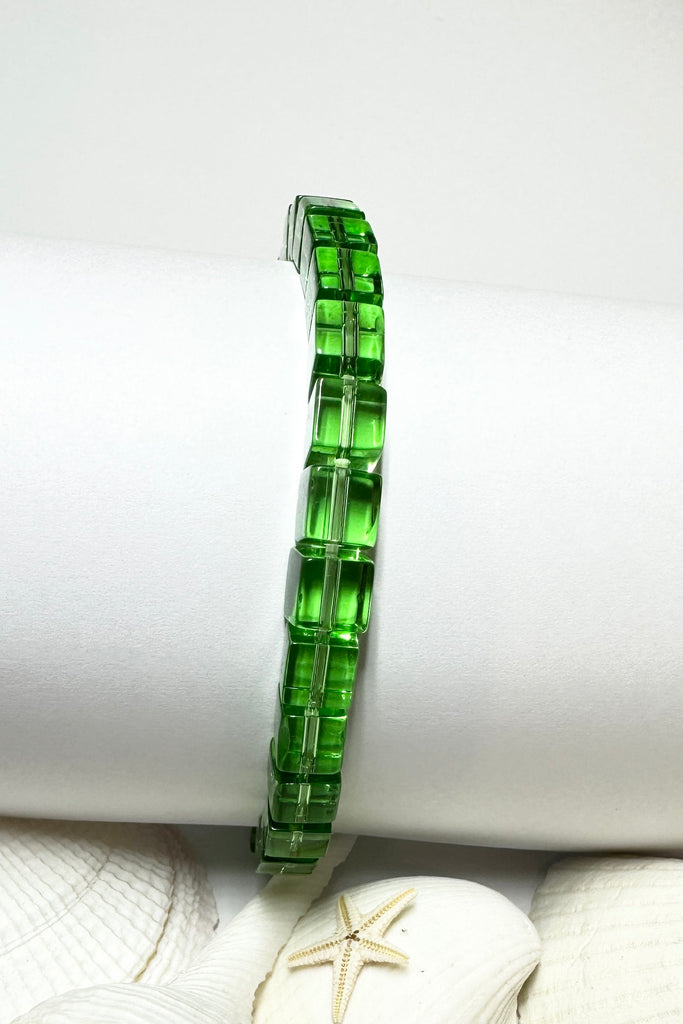 Perfectly easy and so pretty this bracelet of clear soft apple green glass square bead on a stretch band