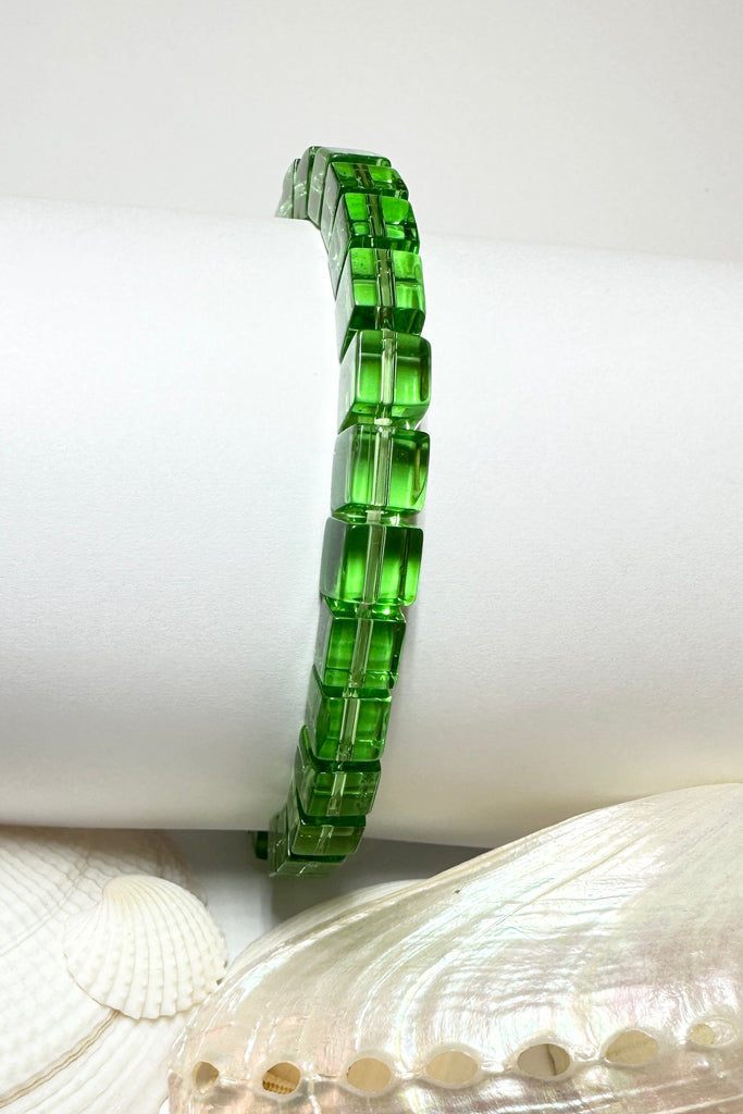 Perfectly easy and so pretty this bracelet of clear soft apple green glass square bead on a stretch band