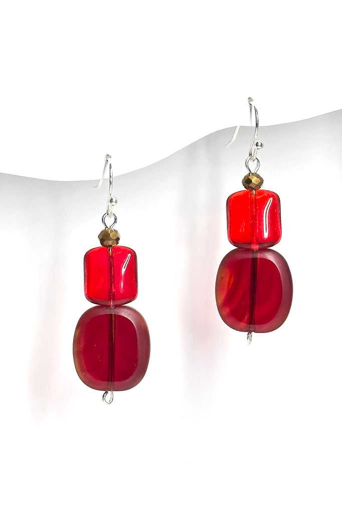 The Earrings red Trio Drop are the perfect pop of colour for your summer wardrobe. 