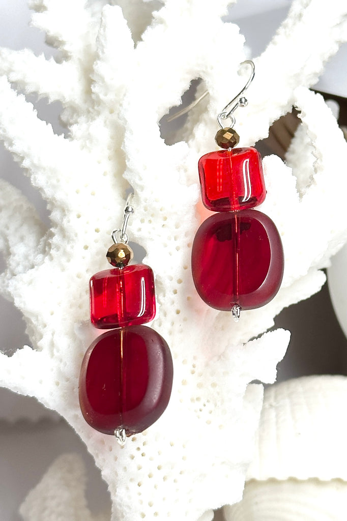 The Earrings red Trio Drop are the perfect pop of colour for your summer wardrobe. 