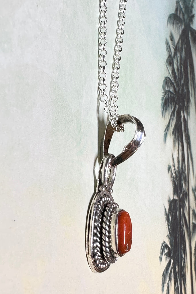This Red Coral Vintage Pendant  Oval is an old piece that has a "village make" feel to it. Made with an centre of old coral and set in 925 silver this pendant has a really lovely feel to it, with no signs of wear.