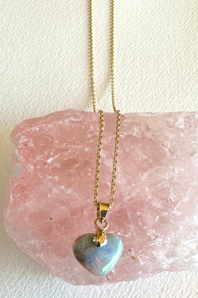 Pendant length is 2cm Natural solid Australian Crystal opal. One off piece. This tiny adorable little opal heart pendant has misty clouds of mainly green with some gold and blue as well. The surface has a beautiful polish.
