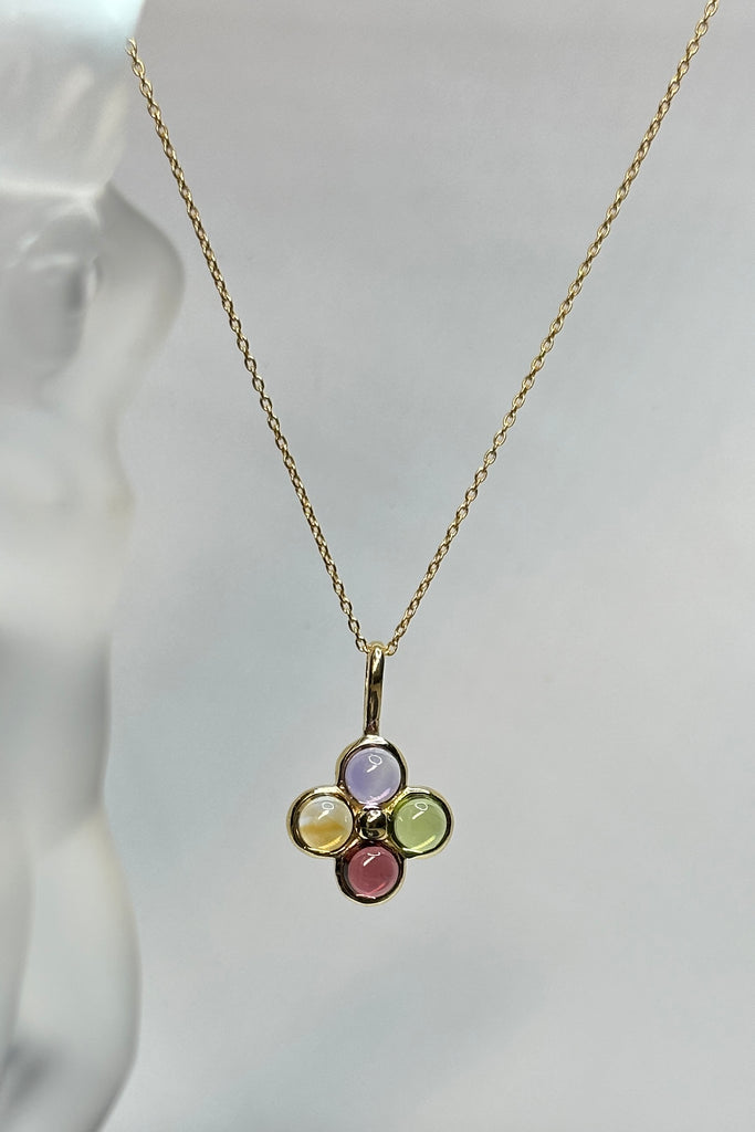 Feel the calm and the harmony of these four coloured gemstones that represent the harmony of the earth. A circle of gemstones set in 9ct gold vermeil.