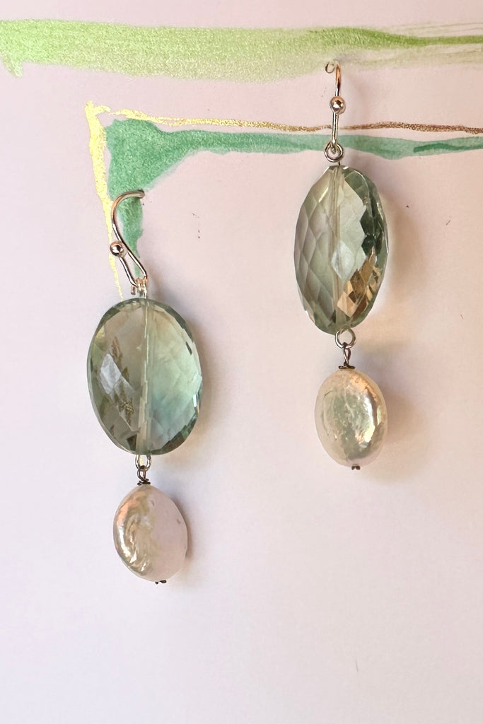 The Histoire earrings are designed using an assortment of new, old and repurposed stones, each stone has a story to tell and together they are a powerful link to what was, and to what is to come.&nbsp;

Green Fluorite faceted bead.
Freshwater coin pearl.
Drop style earrings statement earrings.