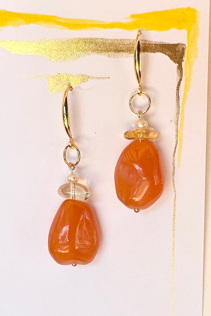The Histoire earrings are designed using an assortment of new, old and repurposed stones, each stone has a story to tell and together they are a powerful link to what was, and to what is to come.&nbsp;

Softly rounded Carnelian bead.
Citrine nugget bead and a tiny pearl.
Drop style earrings statement earrings.