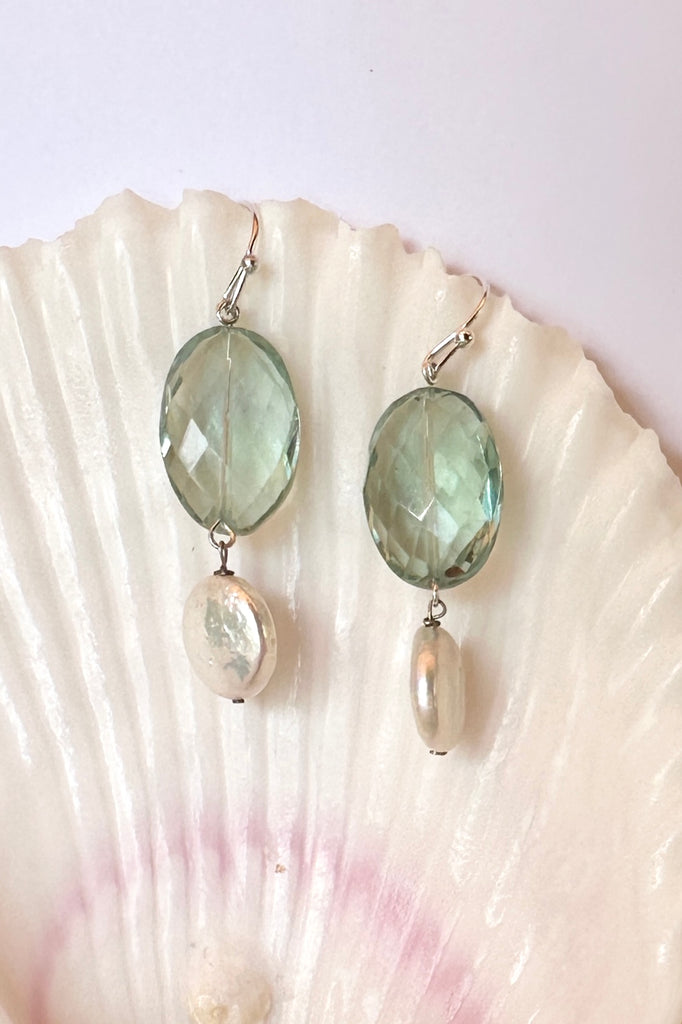 The Histoire earrings are designed using an assortment of new, old and repurposed stones, each stone has a story to tell and together they are a powerful link to what was, and to what is to come.&nbsp;

Green Fluorite faceted bead.
Freshwater coin pearl.
Drop style earrings statement earrings.