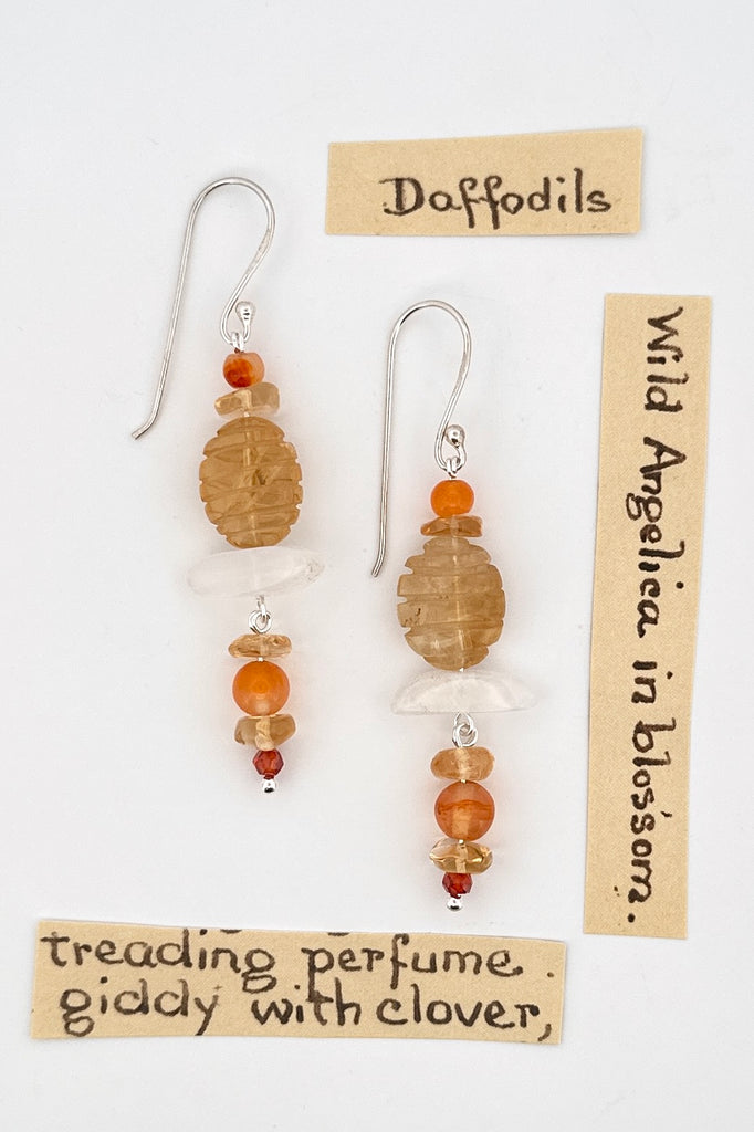 Drop style earrings statement earrings. Stones are a carved Citrine bead, natural Carnelian and Moonstone. Every stone earring will have different colour shading and intensity. Some are lighter and some have slight streaks. 