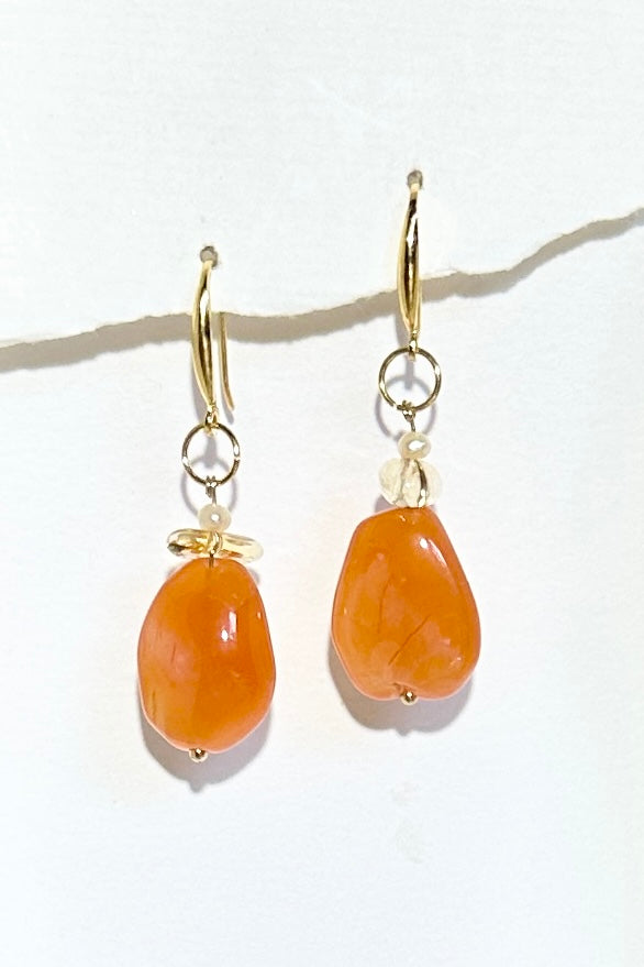 The Histoire earrings are designed using an assortment of new, old and repurposed stones, each stone has a story to tell and together they are a powerful link to what was, and to what is to come.&nbsp;

Softly rounded Carnelian bead.
Citrine nugget bead and a tiny pearl.
Drop style earrings statement earrings.
