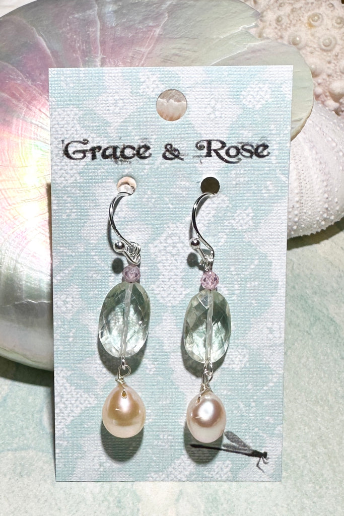 The earrings Crystal Lake are as fresh and pretty as a mountain stream. Sparkling pale minty green with pearls and softest pink.

Green Prasiolite faceted bead.
Peachy pink freshwater pearl.
Drop style earrings statement earrings.