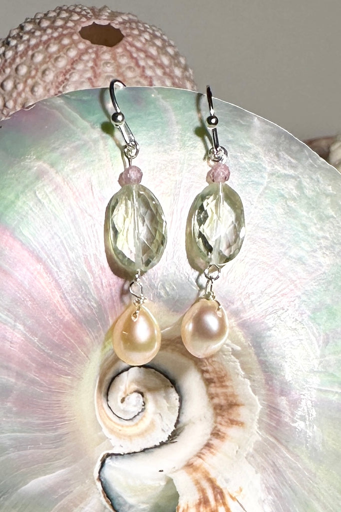 The earrings Crystal Lake are as fresh and pretty as a mountain stream. Sparkling pale minty green with pearls and softest pink.

Green Prasiolite faceted bead.
Peachy pink freshwater pearl.
Drop style earrings statement earrings.