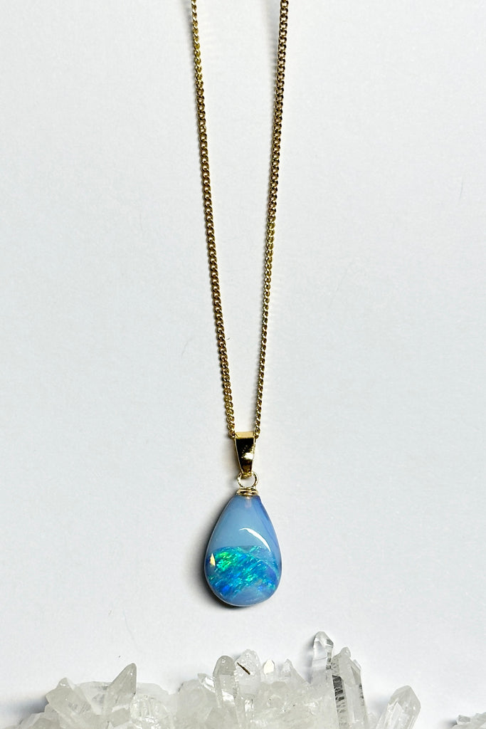 Very pretty droplet shaped opal pendant with green and blue flashes.