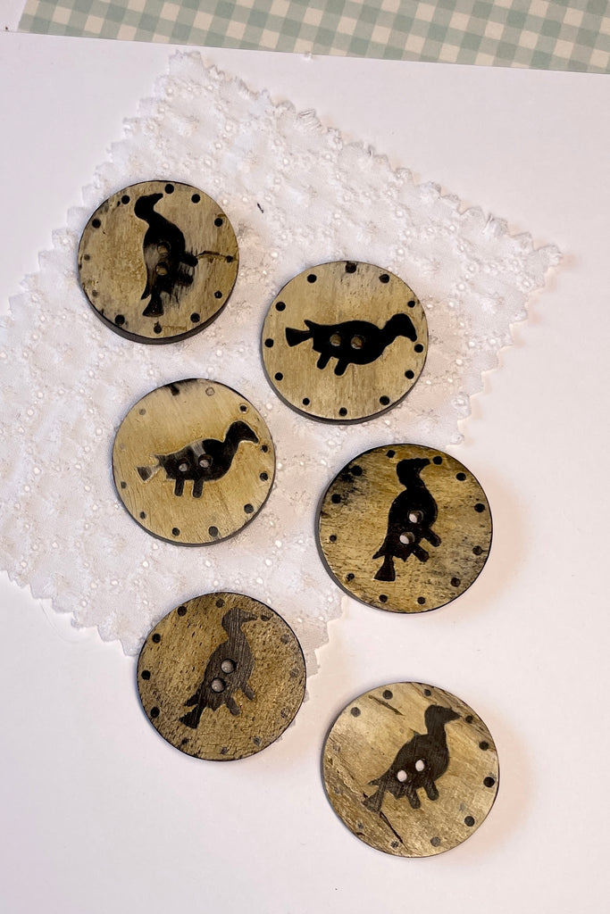 These quirky buttons are carved from horn in India, they are extremely unusual. Suitable for a jacket or skirt, every bird is different.