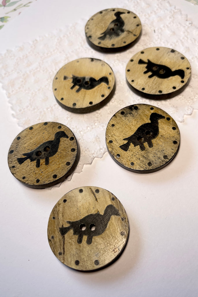 These quirky buttons are carved from horn in India, they are extremely unusual. Suitable for a jacket or skirt, every bird is different.