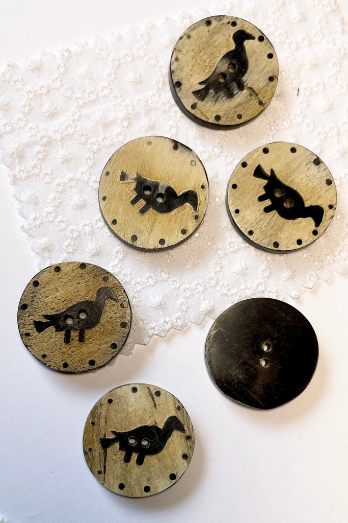 These quirky buttons are carved from horn in India, they are extremely unusual. Suitable for a jacket or skirt, every bird is different.