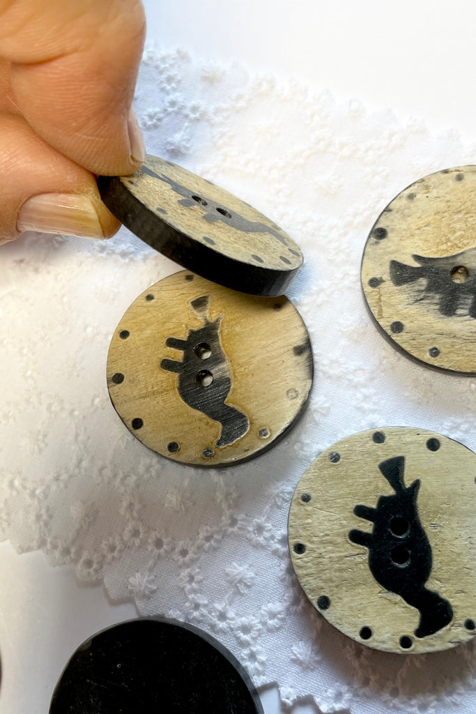 These quirky buttons are carved from horn in India, they are extremely unusual. Suitable for a jacket or skirt, every bird is different.