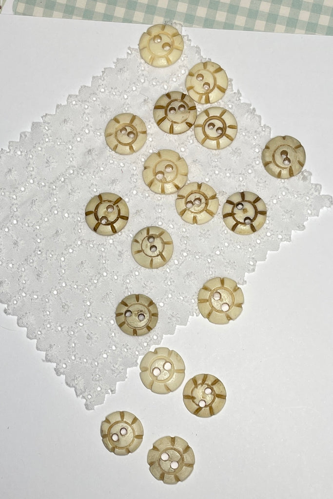 These quirky buttons are carved from bone in India, they are extremely unusual, the holes are all placed differently showing that these are indeed a "village" make, every pattern and button is different.